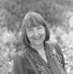 Porträttbild på Carol J. Adams